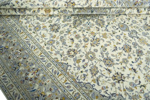 Close-up detail of 2000s Kashan rug from Iran / Persia showing Wool weave