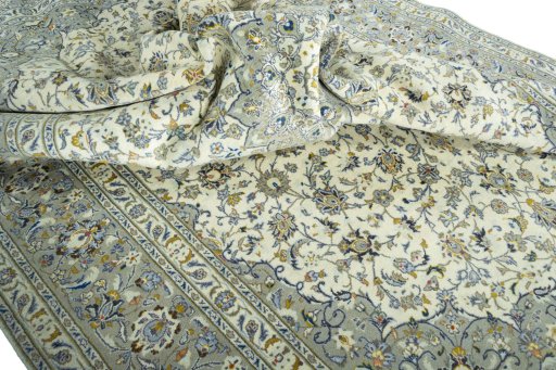 Surface texture of 2000s Kashan rug with natural Wool and intricate pattern