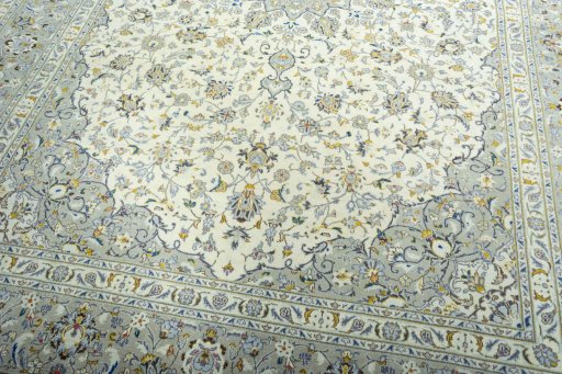 Close-up detail of 2000s Kashan rug from Iran / Persia showing Wool weave