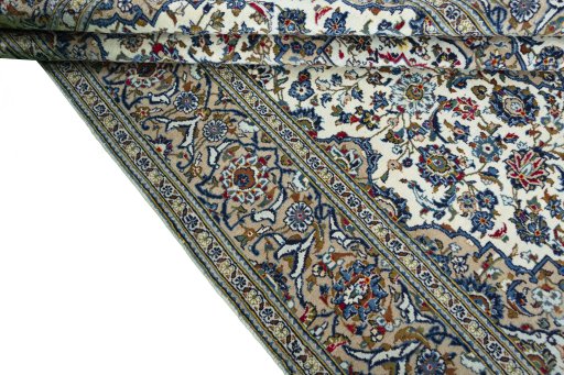 Close-up detail of 2000s Kashan rug from Iran / Persia showing Wool weave
