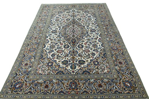 Surface texture of 2000s Kashan rug with natural Wool and intricate pattern