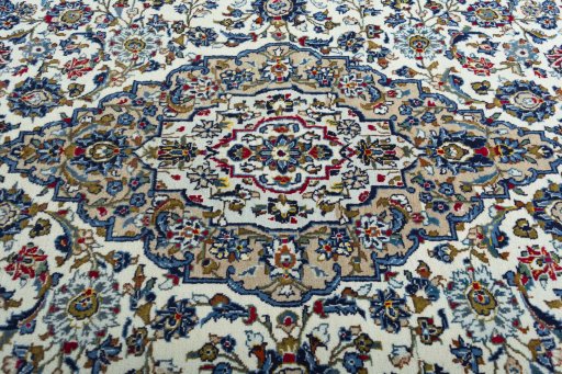 Central medallion detail of 2000s Kashan rug from Iran / Persia