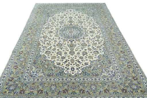 Surface texture of 2000s Kashan rug with natural Cork and intricate pattern