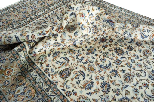 Surface texture of 2000s Kashan rug with natural Wool and intricate pattern