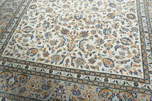 Close-up detail of 2000s Kashan rug from Iran / Persia showing Wool weave