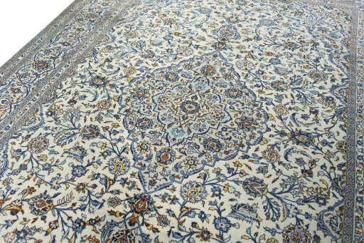 Backside of handmade 2000s Kashan rug showing knot structure and weave density