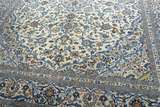 Close-up detail of 2000s Kashan rug from Iran / Persia showing Wool weave