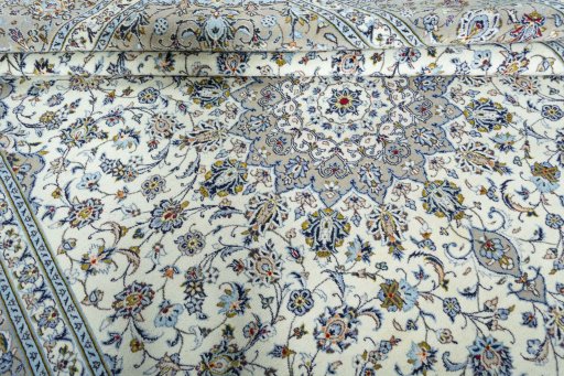 Close-up detail of New Kashan rug from Iran / Persia showing Wool weave