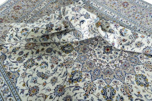 Surface texture of New Kashan rug with natural Wool and intricate pattern