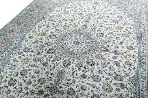 Backside of handmade New Kashan rug showing knot structure and weave density