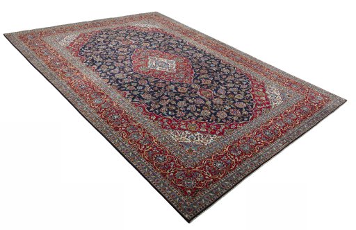 Close-up detail of 2000s Kashan rug from Iran / Persia showing Wool weave