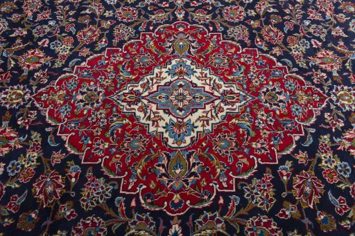 Central medallion detail of 2000s Kashan rug from Iran / Persia