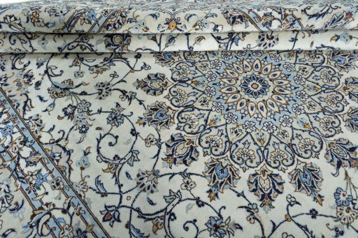 Close-up detail of 2000s Kashan rug from Iran / Persia showing Wool weave