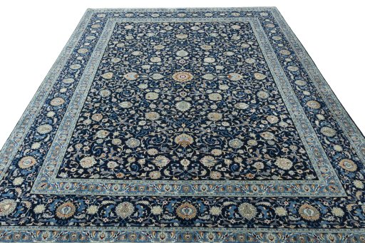 Surface texture of 2000s Kashan rug with natural Wool and intricate pattern