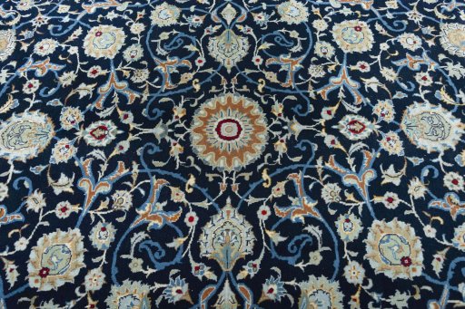 Central medallion detail of 2000s Kashan rug from Iran / Persia