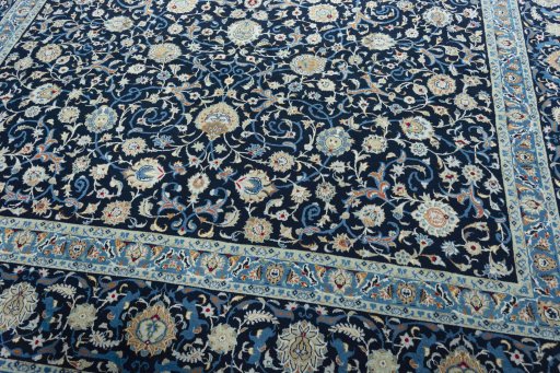 Close-up detail of 2000s Kashan rug from Iran / Persia showing Wool weave