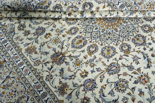Close-up detail of 2000s Kashan rug from Iran / Persia showing Wool weave