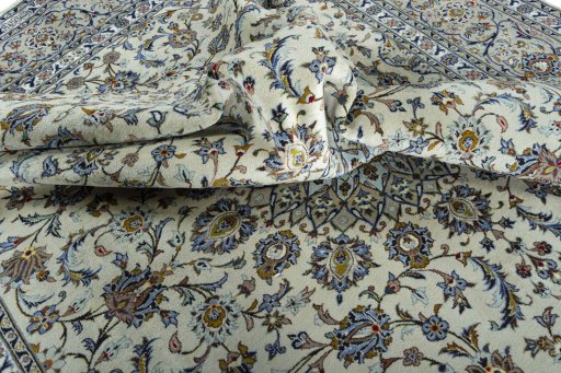 Surface texture of 2000s Kashan rug with natural Wool and intricate pattern