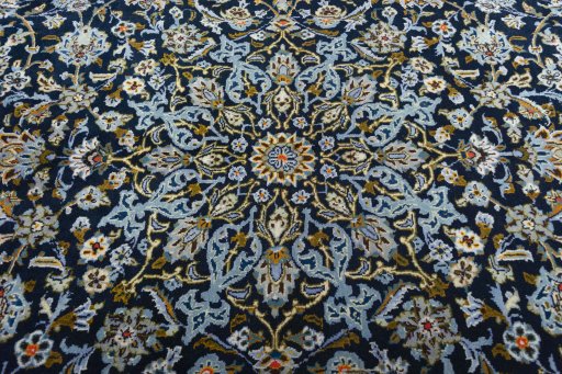 Central medallion detail of 2000s Kashan rug from Iran / Persia