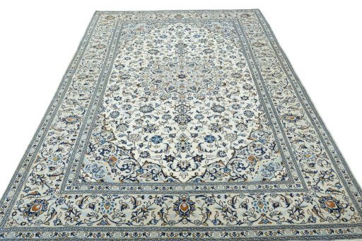 Surface texture of 2000s Kashan rug with natural Wool and intricate pattern