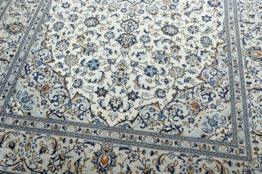 Close-up detail of 2000s Kashan rug from Iran / Persia showing Wool weave