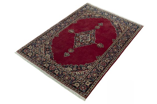Corner detail of 1930s Kashan rug showing border pattern and Wool pile
