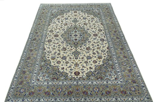 Surface texture of 2000s Kashan rug with natural Cork and intricate pattern