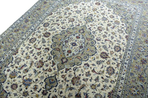 Backside of handmade 2000s Kashan rug showing knot structure and weave density