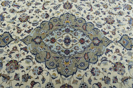 Central medallion detail of 2000s Kashan rug from Iran / Persia