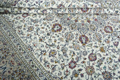 Close-up detail of 2000s Kashan rug from Iran / Persia showing Wool weave