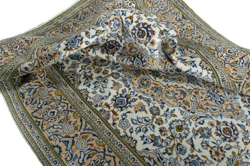 Surface texture of 2000s Kashan rug with natural Wool and intricate pattern