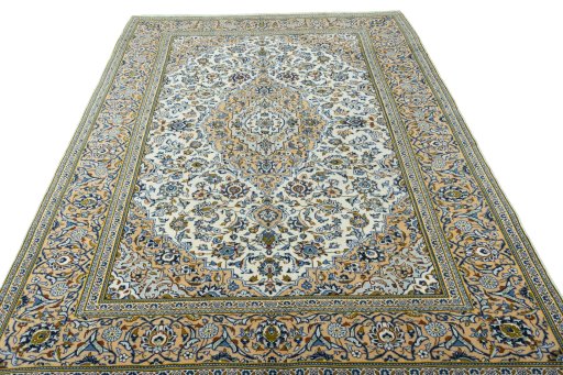 Surface texture of 2000s Kashan rug with natural Wool and intricate pattern