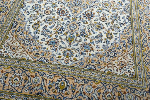 Close-up detail of 2000s Kashan rug from Iran / Persia showing Wool weave