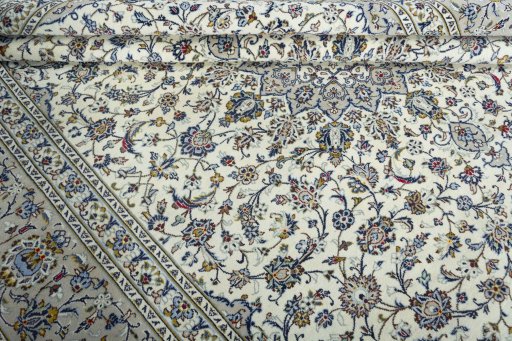 Close-up detail of 2000s Kashan rug from Iran / Persia showing Wool weave