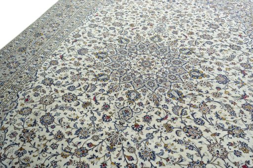 Backside of handmade 2000s Kashan rug showing knot structure and weave density