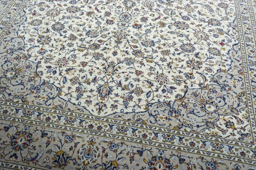 Close-up detail of 2000s Kashan rug from Iran / Persia showing Wool weave