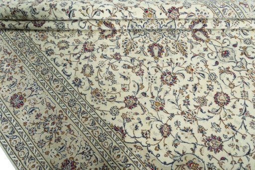 Close-up detail of 2000s Kashan rug from Iran / Persia showing Wool weave