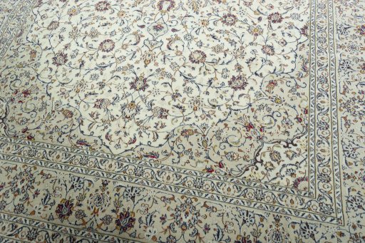 Close-up detail of 2000s Kashan rug from Iran / Persia showing Wool weave