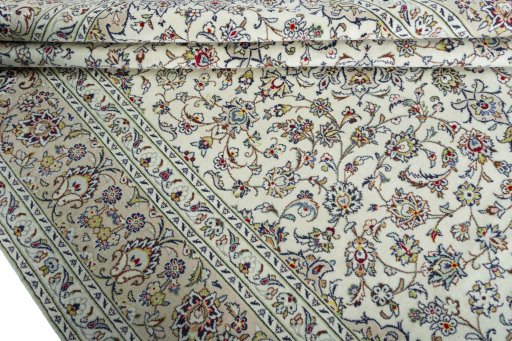 Close-up detail of 2000s Kashan rug from Iran / Persia showing Wool weave