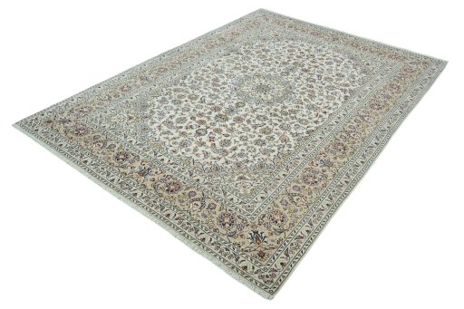 Corner detail of 2000s Kashan rug showing border pattern and Wool pile