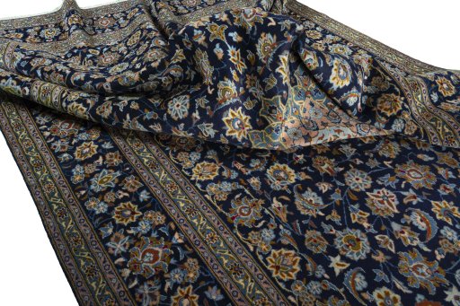 Surface texture of 1970s Kashan rug with natural Wool and intricate pattern