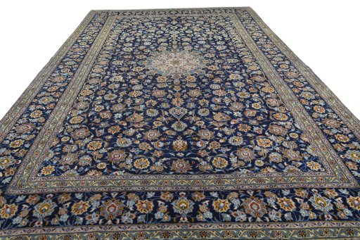 Surface texture of 1970s Kashan rug with natural Wool and intricate pattern