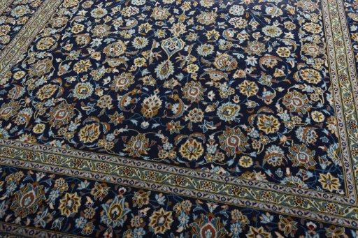 Close-up detail of 1970s Kashan rug from Iran / Persia showing Wool weave