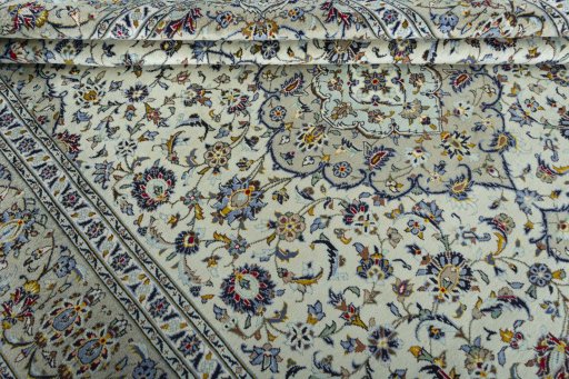 Close-up detail of 2000s Kashan rug from Iran / Persia showing Wool weave
