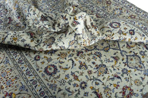 Surface texture of 2000s Kashan rug with natural Wool and intricate pattern
