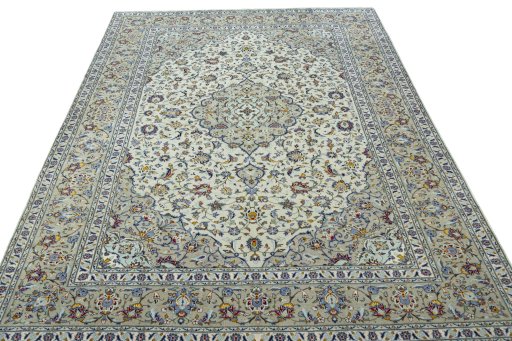 Surface texture of 2000s Kashan rug with natural Wool and intricate pattern
