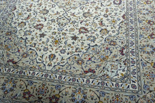 Close-up detail of 2000s Kashan rug from Iran / Persia showing Wool weave