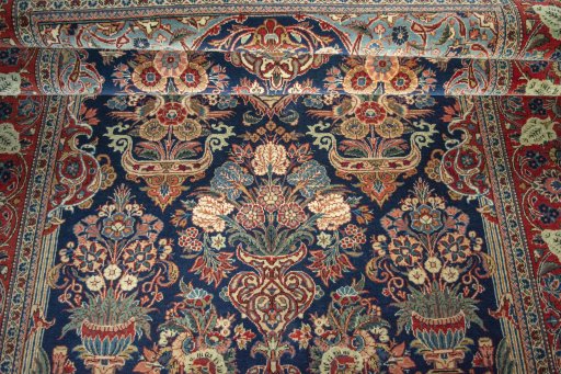 Close-up detail of 1930s Kashan rug from Iran / Persia showing Wool weave
