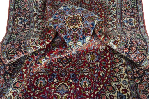 Surface texture of 2000s Kashan rug with natural Cork and intricate pattern