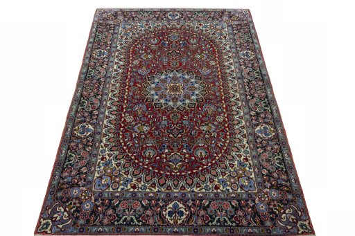 Surface texture of 2000s Kashan rug with natural Cork and intricate pattern
